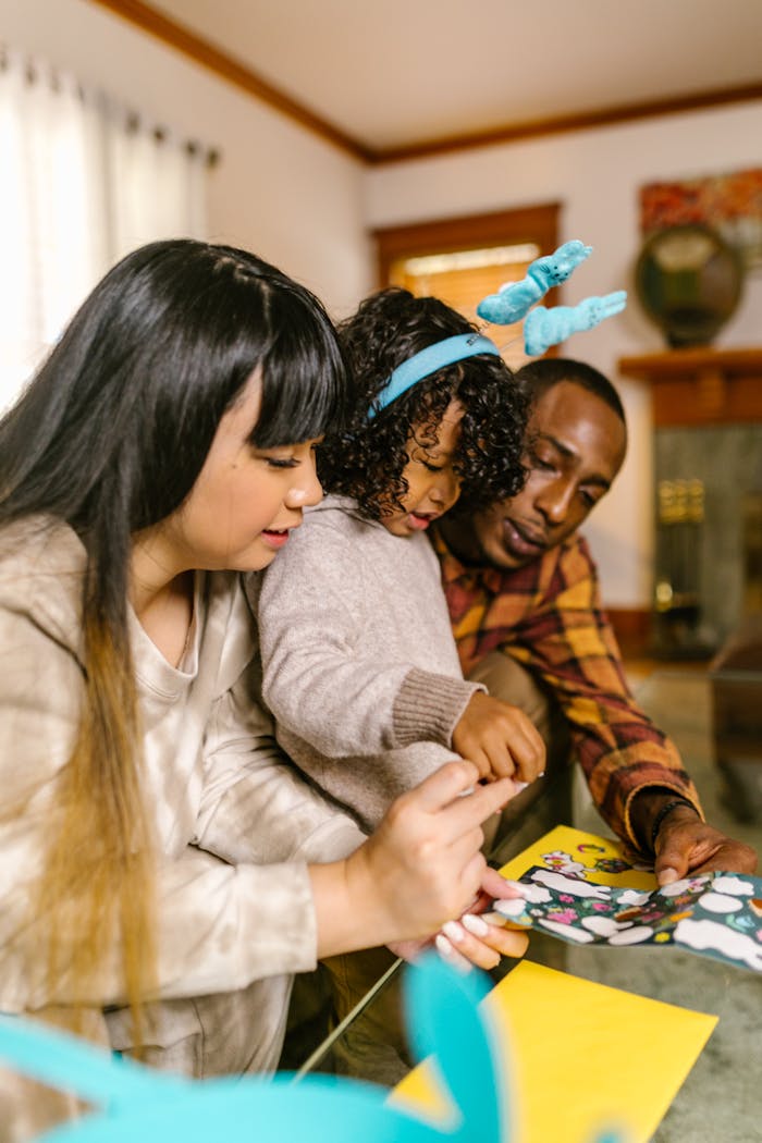 Crafting Captivating Headlines: Your awesome post title goes here A cheerful family crafting Easter decorations indoors, embracing holiday spirit.